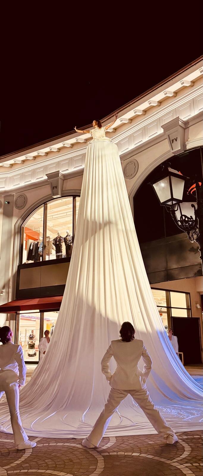 Giant white gown with performers
