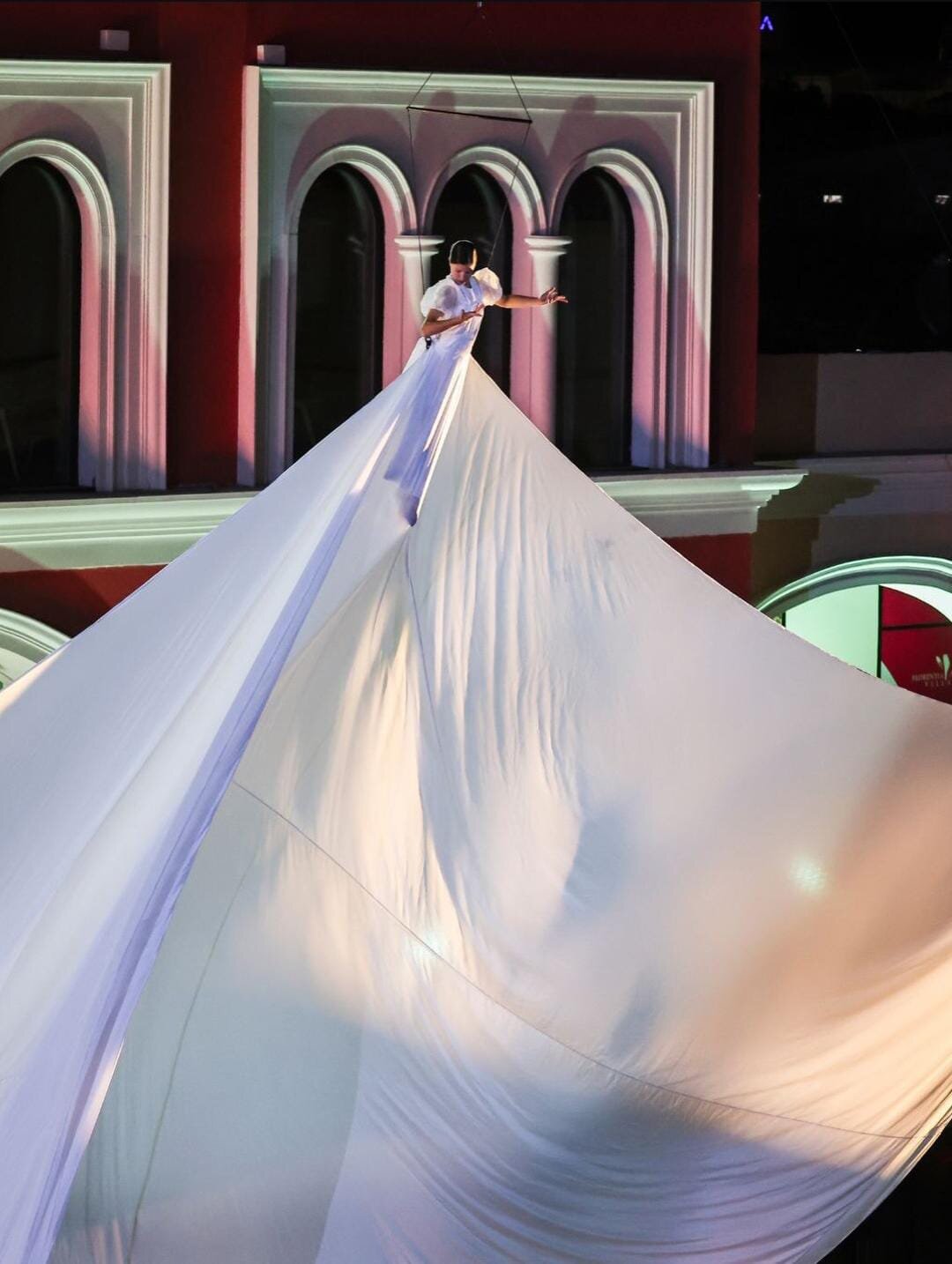 Performer on a giant white gown