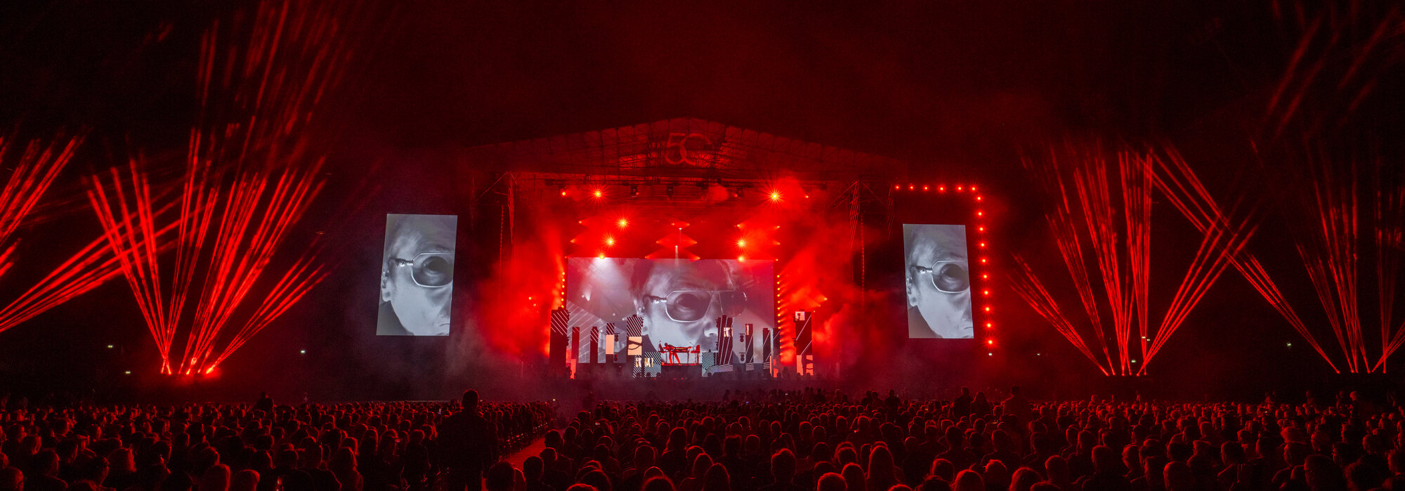 Red laser fans across the festival stage