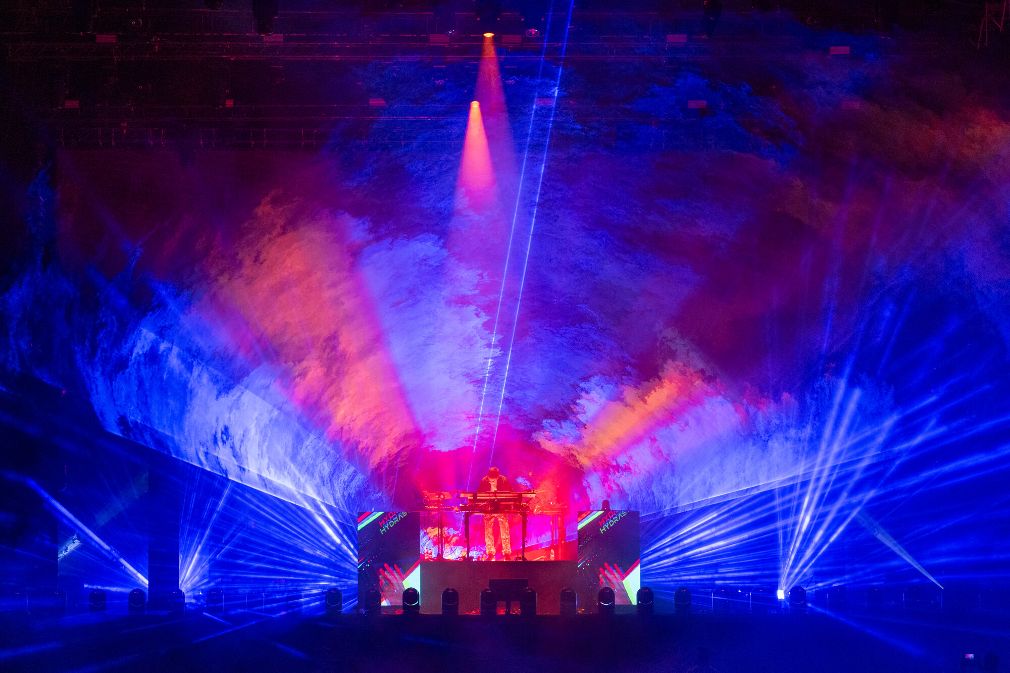 Red and blue beams through haze