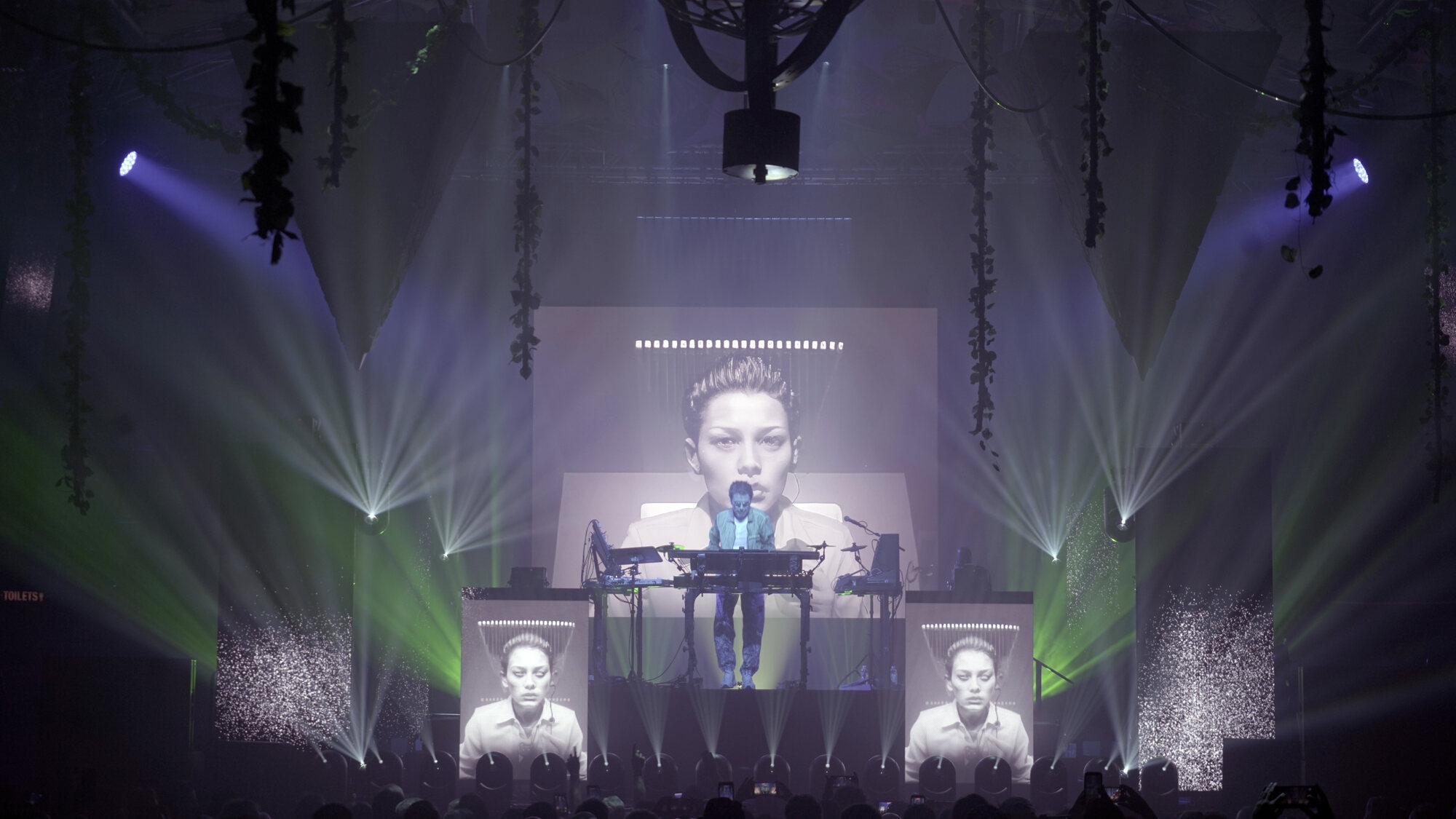 White beams around the central screen
